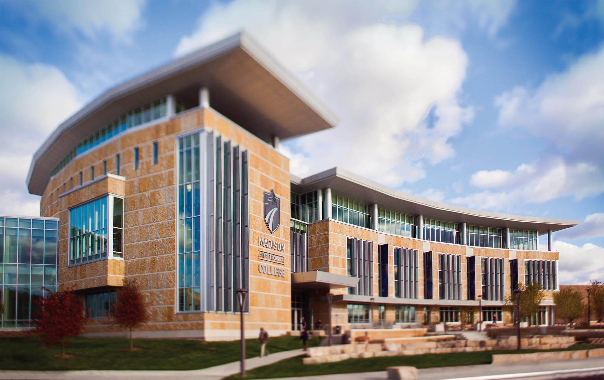 Exterior of Madison Area Technical College campus building on a sunny day.