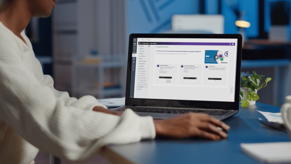 A woman using a laptop, which features the new User Setup page in Panorama.