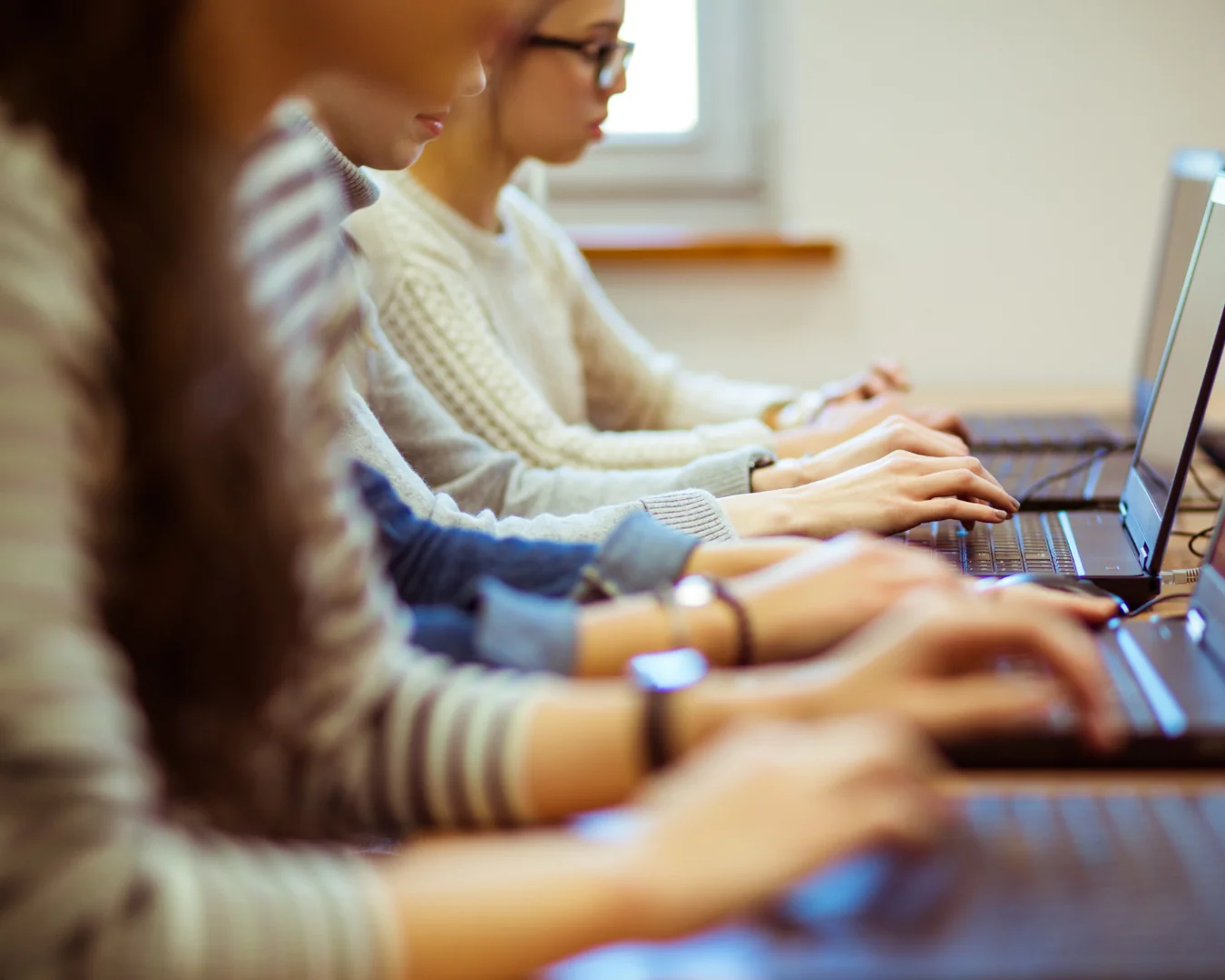Students taking tests in a testing center.