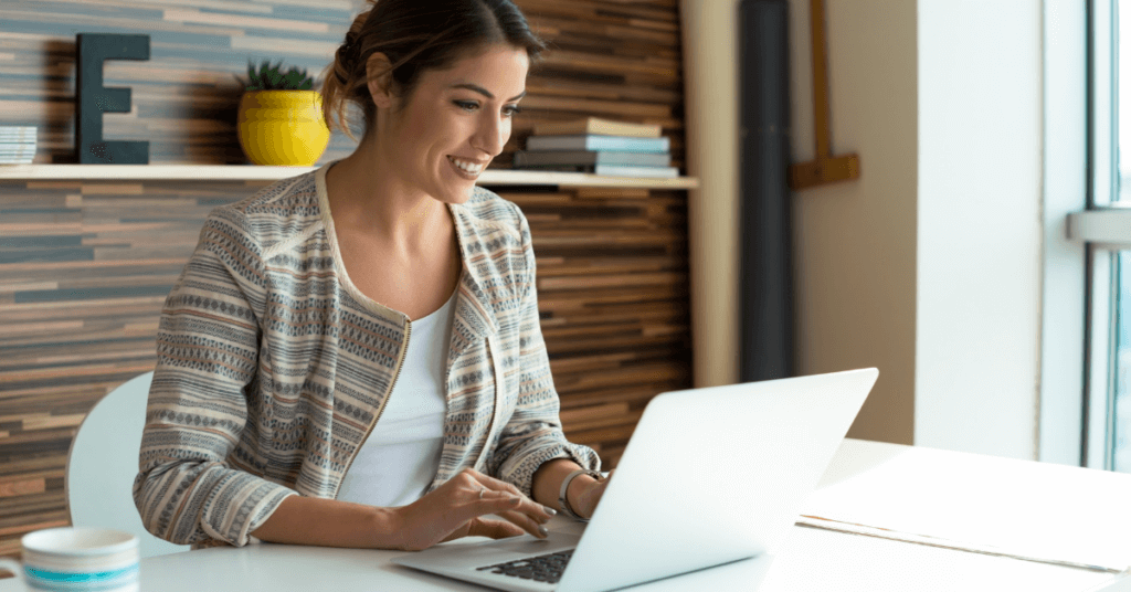 Woman sitting at computer.