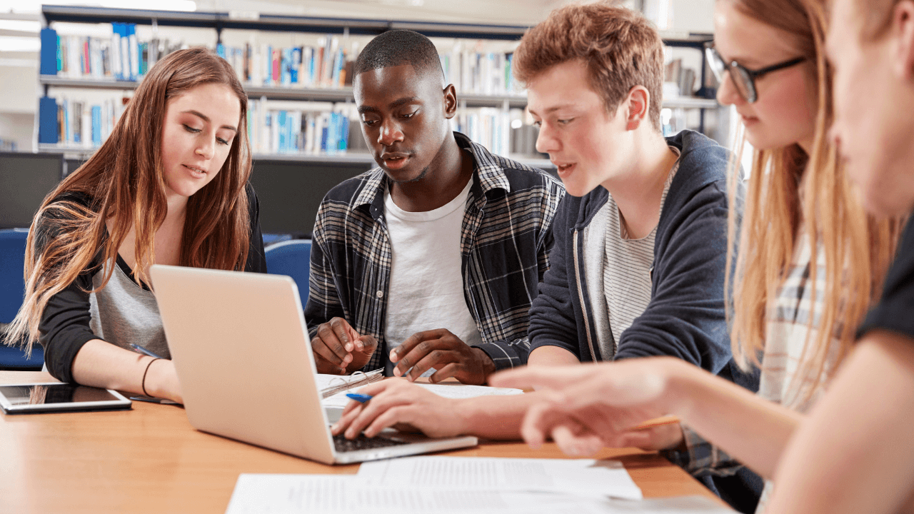 Students working together on a laptop