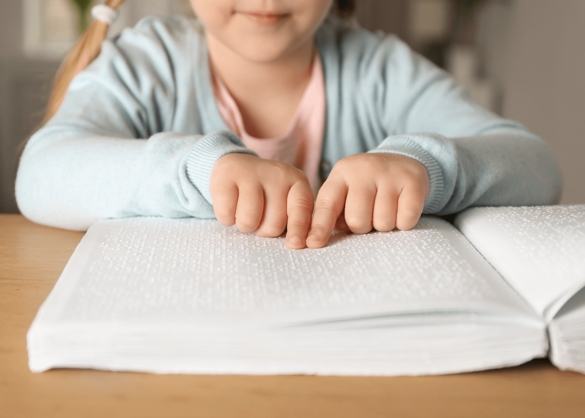 A child reading braille.