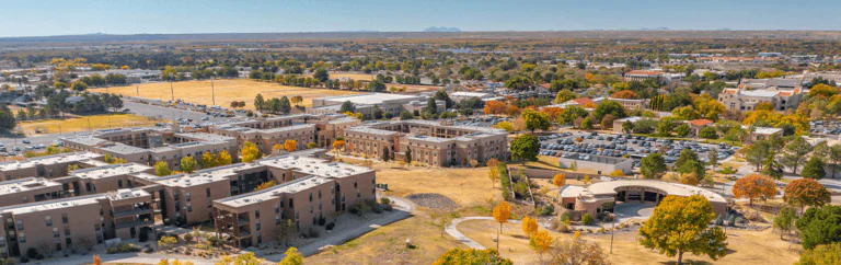 An aerial view of the New Mexico State University campus during the day.