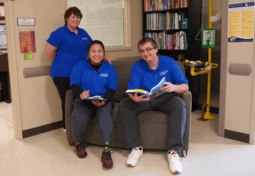 A group of students in a library.