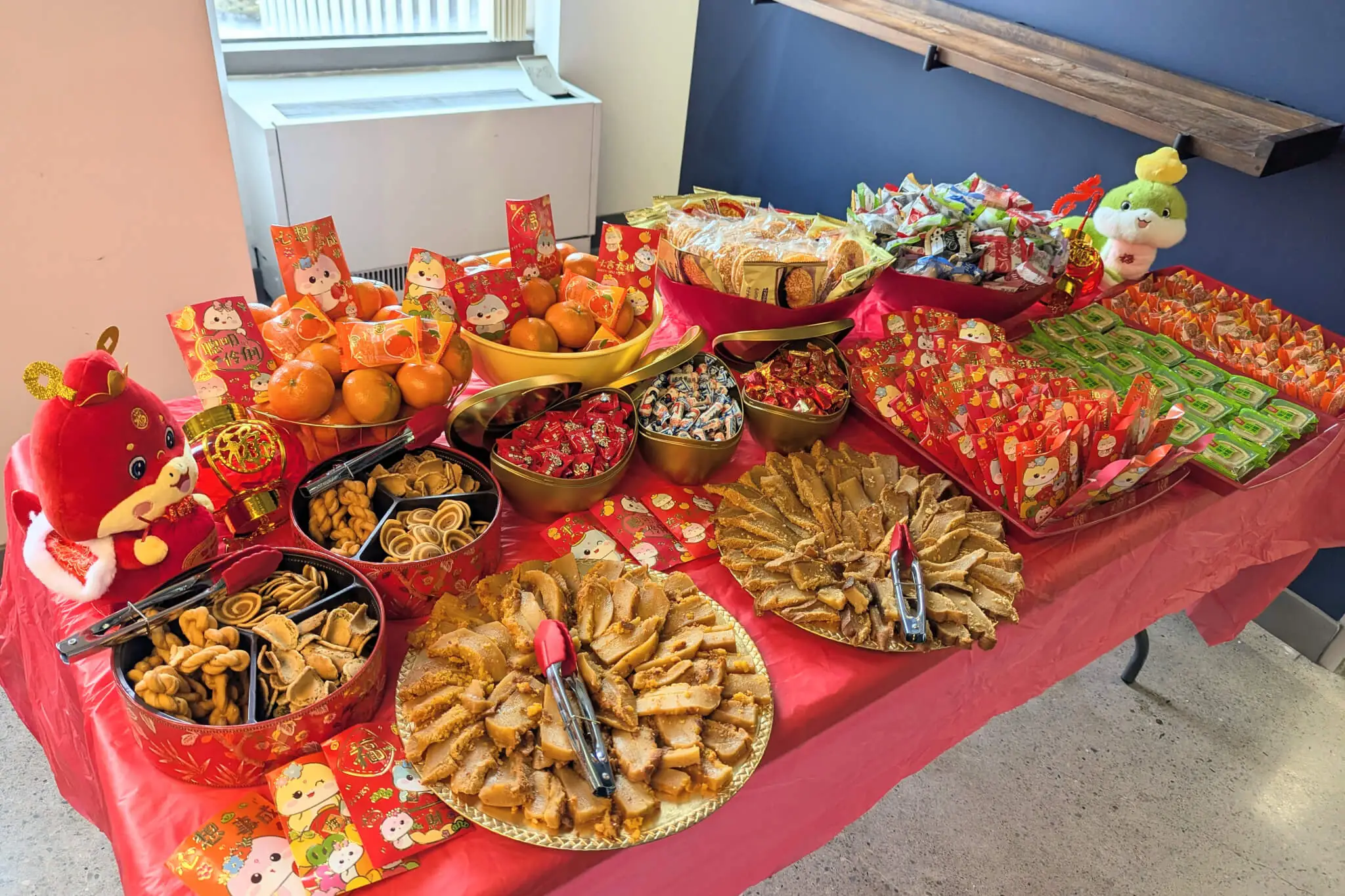 A table with a variety of food items, showcasing an inviting spread for guests.