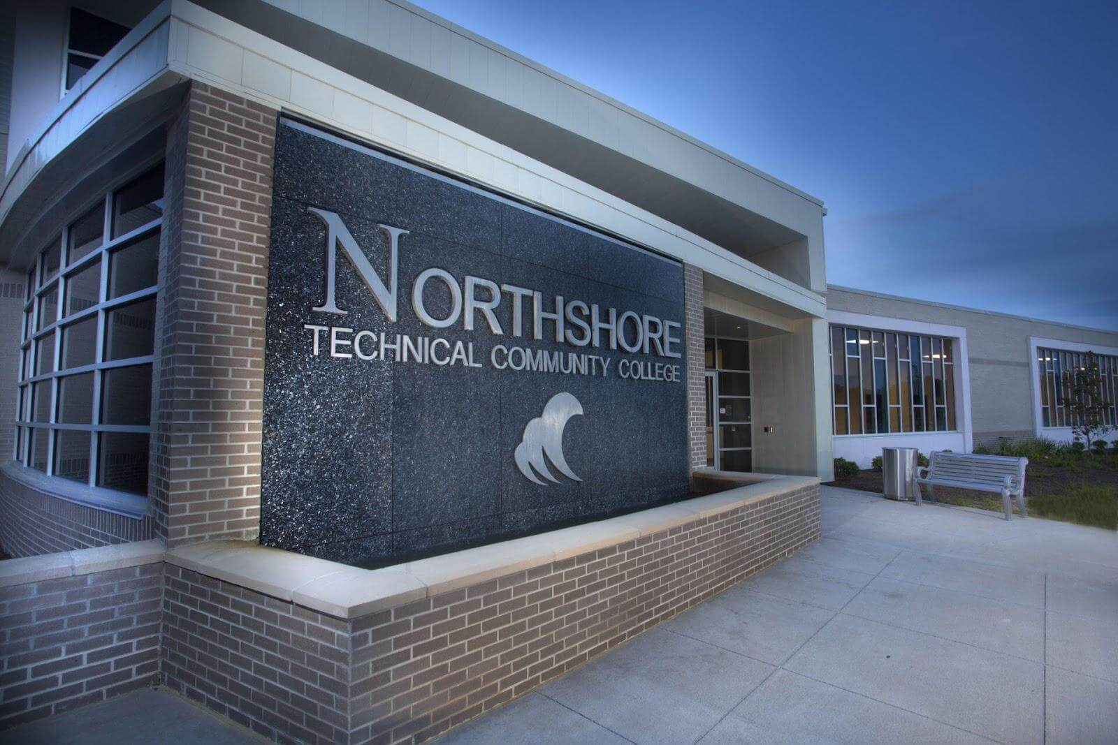 Two Northshore Technical Community College (NTCC) logo on the building.