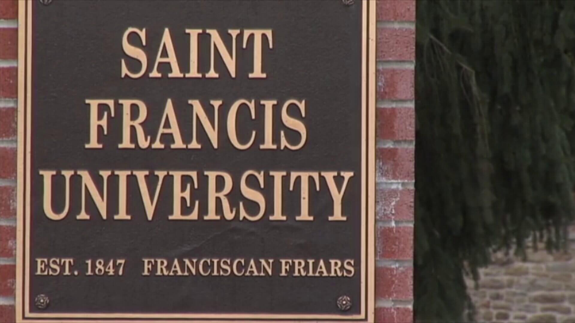 a Saint Francis University established 1847 plaque.