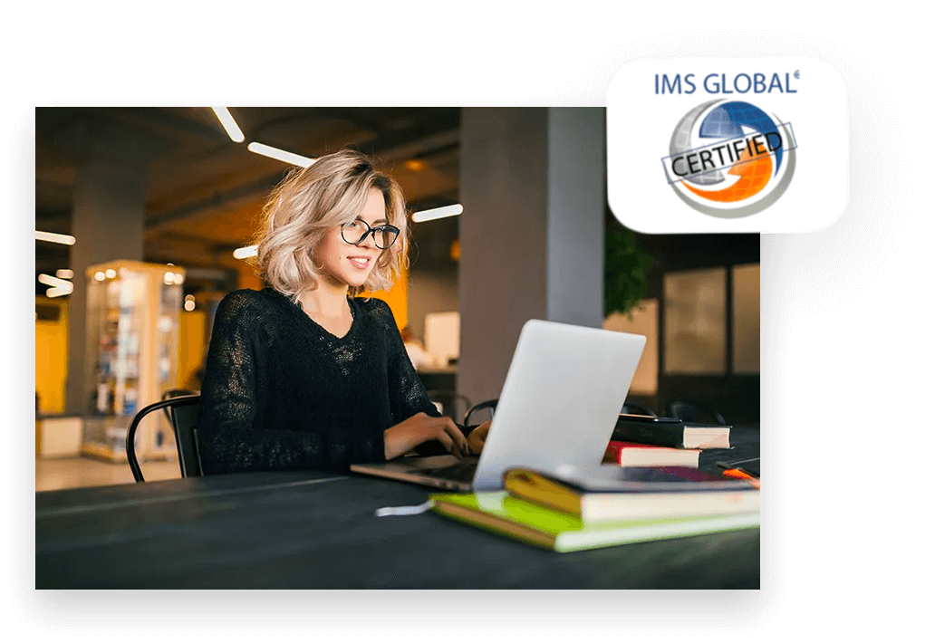 A girl sitting in front of a computer with an IMS Global Certificate badge.