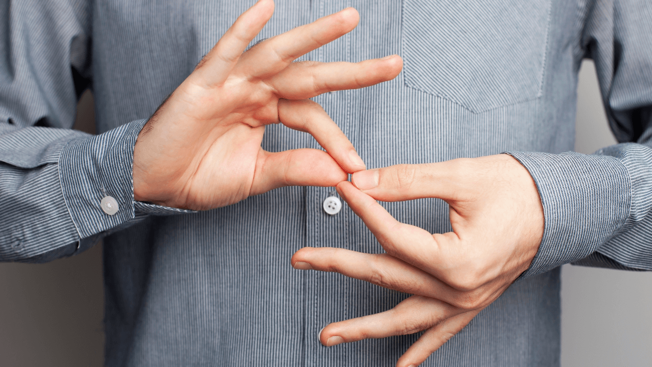 An interpreter doing sign language