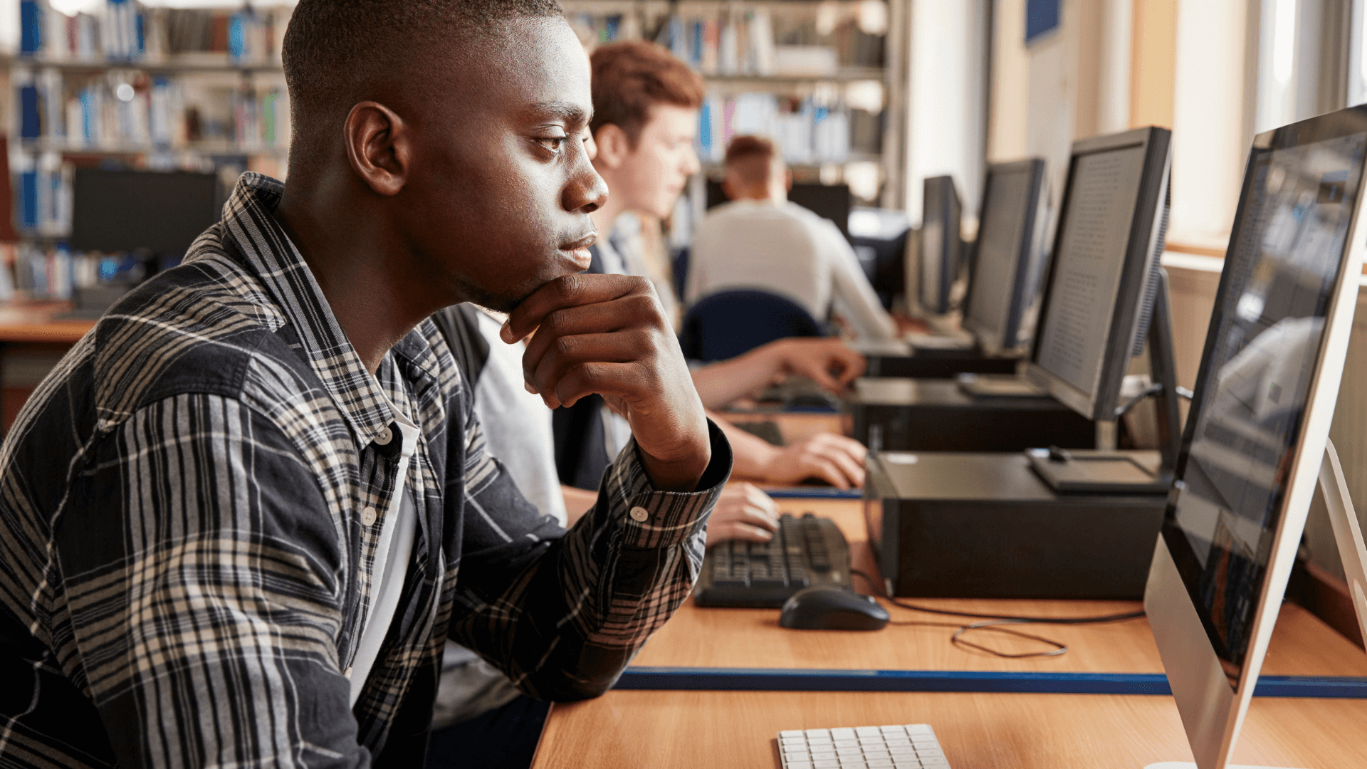 man looking at computer