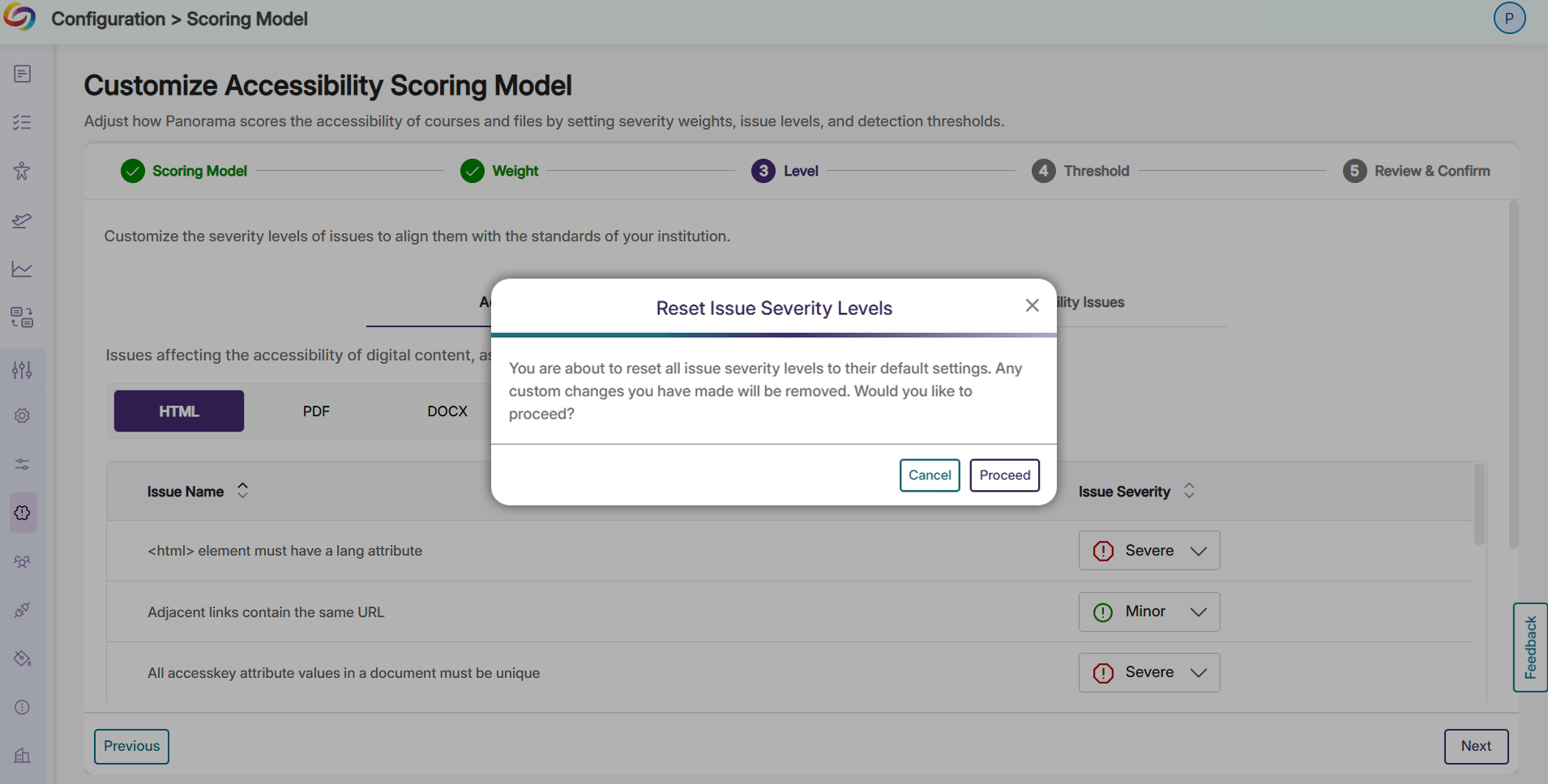 YuJa Scoring Model page with a popup window asking the user if they would like to proceed with resetting issue severity levels to their default settings.