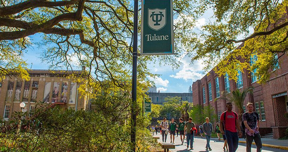 Students walking on the Tulane University campus.